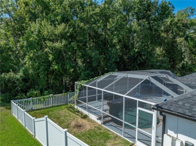 Step into modern comfort and style with this stunning 4-bedroom on Lexington Oaks Golf Club in Florida - for sale on GolfHomes.com, golf home, golf lot