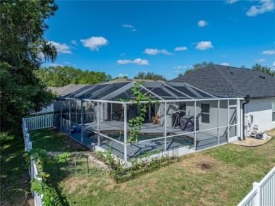 Step into modern comfort and style with this stunning 4-bedroom on Lexington Oaks Golf Club in Florida - for sale on GolfHomes.com, golf home, golf lot