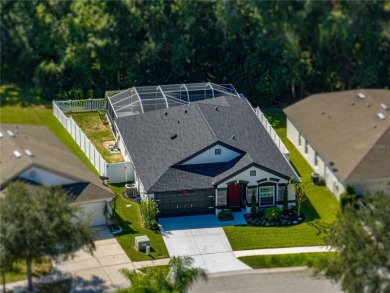 Step into modern comfort and style with this stunning 4-bedroom on Lexington Oaks Golf Club in Florida - for sale on GolfHomes.com, golf home, golf lot