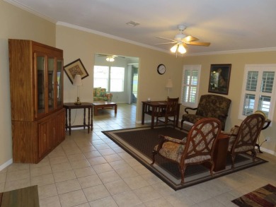 This huge 2272 sf 3/2 home under air, is located on the 7th Tee on Crane Lakes Golf and Country Club in Florida - for sale on GolfHomes.com, golf home, golf lot