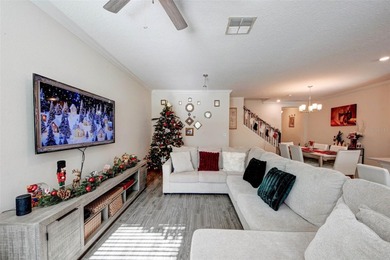 This beautifully maintained 3-bedroom, 2.5-bathroom townhome on ChampionsGate Golf Resort in Florida - for sale on GolfHomes.com, golf home, golf lot