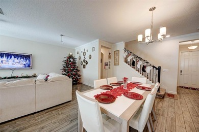 This beautifully maintained 3-bedroom, 2.5-bathroom townhome on ChampionsGate Golf Resort in Florida - for sale on GolfHomes.com, golf home, golf lot