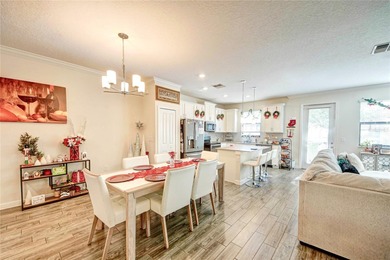 This beautifully maintained 3-bedroom, 2.5-bathroom townhome on ChampionsGate Golf Resort in Florida - for sale on GolfHomes.com, golf home, golf lot