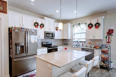 This beautifully maintained 3-bedroom, 2.5-bathroom townhome on ChampionsGate Golf Resort in Florida - for sale on GolfHomes.com, golf home, golf lot