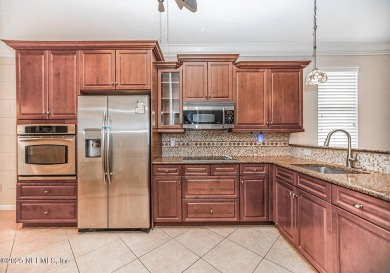 Waterfront Home with an Assumable Mortgage! Luxurious Living in on Slammer and Squire Golf Course in Florida - for sale on GolfHomes.com, golf home, golf lot