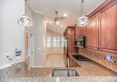 Waterfront Home with an Assumable Mortgage! Luxurious Living in on Slammer and Squire Golf Course in Florida - for sale on GolfHomes.com, golf home, golf lot