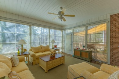 A welcoming front porch and wide foyer opens into this custom on The Golf Club At Cedar Creek in South Carolina - for sale on GolfHomes.com, golf home, golf lot