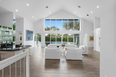 Step into a world where contemporary design and timeless on Bocaire Country Club in Florida - for sale on GolfHomes.com, golf home, golf lot