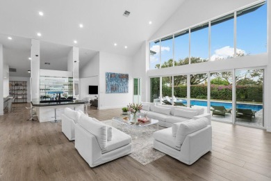 Step into a world where contemporary design and timeless on Bocaire Country Club in Florida - for sale on GolfHomes.com, golf home, golf lot