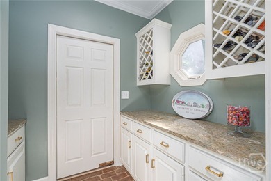 This beautifully renovated home is situated on large .74 acre on  in Georgia - for sale on GolfHomes.com, golf home, golf lot