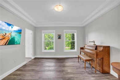 Experience refined living in this stunning 5-bed, 4-bath home on on Vintage Golf Course in Minnesota - for sale on GolfHomes.com, golf home, golf lot