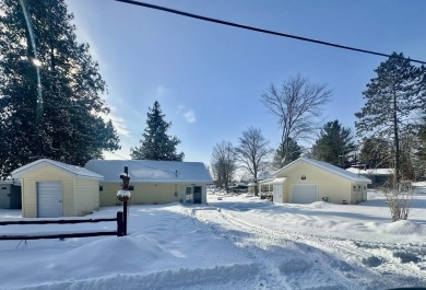 Imagine your perfect getaway! This charming property offers 82 on Eagle Glen Golf Course in Michigan - for sale on GolfHomes.com, golf home, golf lot