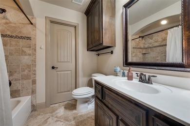 Stunning 4-bedroom, 3-bath home located in a 24-hour gated and on The Golf Club at Resort Eagle Mountain Lake in Texas - for sale on GolfHomes.com, golf home, golf lot