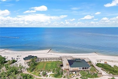 Beautiful warm tones and textures await you with expansive golf on Pelicans Nest Golf Club in Florida - for sale on GolfHomes.com, golf home, golf lot