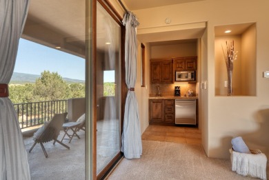 Open Sat 11-2, Sun 1-3. Discover unparalleled luxury in this on Paa-Ko Ridge Golf Club  in New Mexico - for sale on GolfHomes.com, golf home, golf lot