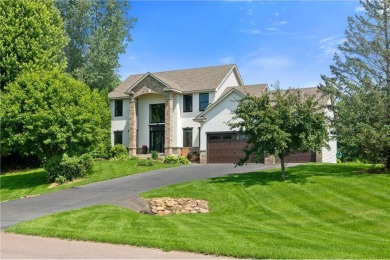 Experience refined living in this stunning 5-bed, 4-bath home on on Vintage Golf Course in Minnesota - for sale on GolfHomes.com, golf home, golf lot