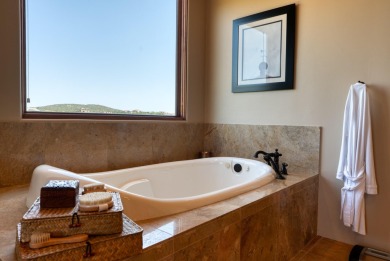 Open Sat 11-2, Sun 1-3. Discover unparalleled luxury in this on Paa-Ko Ridge Golf Club  in New Mexico - for sale on GolfHomes.com, golf home, golf lot