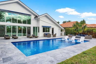 Step into a world where contemporary design and timeless on Bocaire Country Club in Florida - for sale on GolfHomes.com, golf home, golf lot