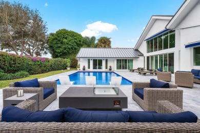 Step into a world where contemporary design and timeless on Bocaire Country Club in Florida - for sale on GolfHomes.com, golf home, golf lot