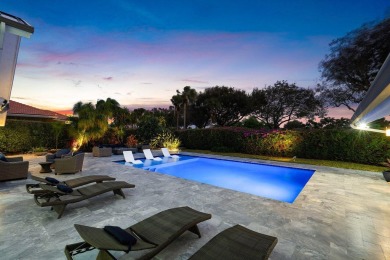 Step into a world where contemporary design and timeless on Bocaire Country Club in Florida - for sale on GolfHomes.com, golf home, golf lot