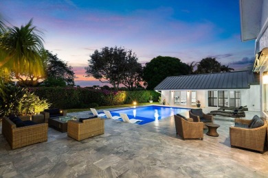 Step into a world where contemporary design and timeless on Bocaire Country Club in Florida - for sale on GolfHomes.com, golf home, golf lot