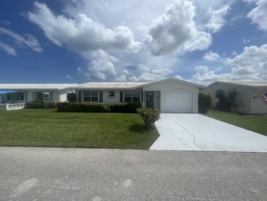 Beautifully updated and modern 2br/2ba home in Leisureville with on Leisureville Community Golf Course in Florida - for sale on GolfHomes.com, golf home, golf lot