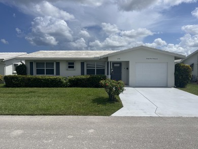 Beautifully updated and modern 2br/2ba home in Leisureville with on Leisureville Community Golf Course in Florida - for sale on GolfHomes.com, golf home, golf lot