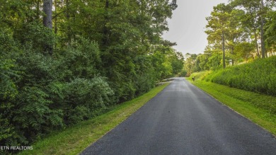 Nestled in the heart of Tellico Village, this extra large (over on Toqua Golf Course - Loudon County in Tennessee - for sale on GolfHomes.com, golf home, golf lot