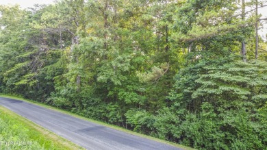 Nestled in the heart of Tellico Village, this extra large (over on Toqua Golf Course - Loudon County in Tennessee - for sale on GolfHomes.com, golf home, golf lot