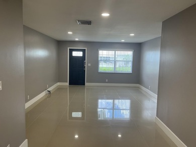 Beautifully updated and modern 2br/2ba home in Leisureville with on Leisureville Community Golf Course in Florida - for sale on GolfHomes.com, golf home, golf lot