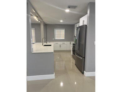 Beautifully updated and modern 2br/2ba home in Leisureville with on Leisureville Community Golf Course in Florida - for sale on GolfHomes.com, golf home, golf lot