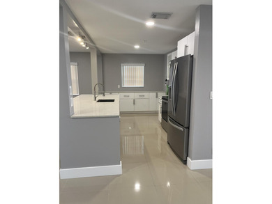 Beautifully updated and modern 2br/2ba home in Leisureville with on Leisureville Community Golf Course in Florida - for sale on GolfHomes.com, golf home, golf lot