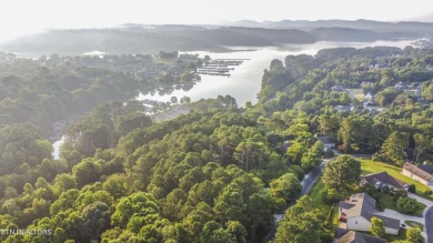 Nestled in the heart of Tellico Village, this extra large (over on Toqua Golf Course - Loudon County in Tennessee - for sale on GolfHomes.com, golf home, golf lot