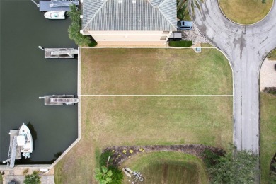 This spectacular waterfront lot is located in the highly-sought on Hammock Dunes Club in Florida - for sale on GolfHomes.com, golf home, golf lot