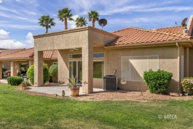 Gracefully nestled along Fairway 15 near the green of the Canyon on Wolf Creek At Paradise Canyon in Nevada - for sale on GolfHomes.com, golf home, golf lot