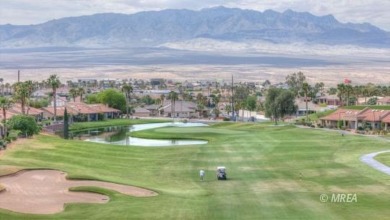 Gracefully nestled along Fairway 15 near the green of the Canyon on Wolf Creek At Paradise Canyon in Nevada - for sale on GolfHomes.com, golf home, golf lot