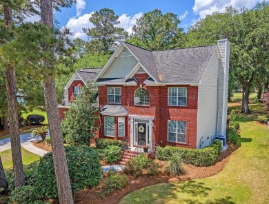 Set against the lush backdrop of the 9th hole at Legend Oaks on Legend Oaks Plantation Golf Club in South Carolina - for sale on GolfHomes.com, golf home, golf lot