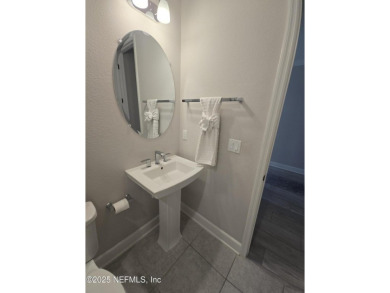 This 2-year-old Adalyn Plan by David Weekley in the resort-style on Golf Club At South Hampton in Florida - for sale on GolfHomes.com, golf home, golf lot