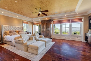 There are maybe a handful of custom homes in the guard gated on TPC At Valencia in California - for sale on GolfHomes.com, golf home, golf lot