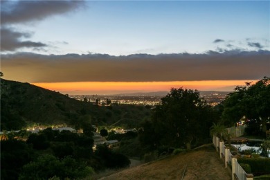This one is special. Nestled on a peaceful, secluded lot in on Anaheim Hills Golf Course in California - for sale on GolfHomes.com, golf home, golf lot