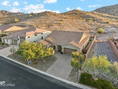 Perched on a premium view lot in Estrella Mountain Ranch, this on Estrella Mountain Ranch Golf Course in Arizona - for sale on GolfHomes.com, golf home, golf lot