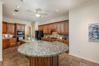 Let the golf cart paths welcome you to this refined single-story on Stonebridge Ranch Country Club in Texas - for sale on GolfHomes.com, golf home, golf lot