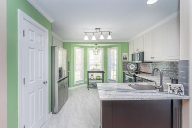 This stunning 3-bedroom, 2-bath home with a spacious flex room on The Golf Club At Cedar Creek in South Carolina - for sale on GolfHomes.com, golf home, golf lot