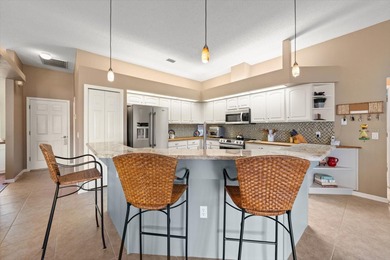 Experience the pinnacle of refined Florida living in this on Heritage Springs Country Club in Florida - for sale on GolfHomes.com, golf home, golf lot