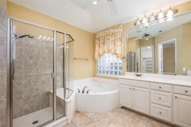 Let the golf cart paths welcome you to this refined single-story on Stonebridge Ranch Country Club in Texas - for sale on GolfHomes.com, golf home, golf lot