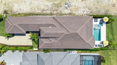 An exceptional, custom-designed residence by Gulfshore Homes on Miromar Lakes Golf Club in Florida - for sale on GolfHomes.com, golf home, golf lot