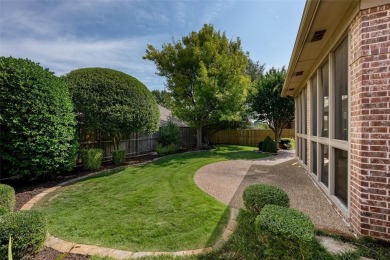 Let the golf cart paths welcome you to this refined single-story on Stonebridge Ranch Country Club in Texas - for sale on GolfHomes.com, golf home, golf lot