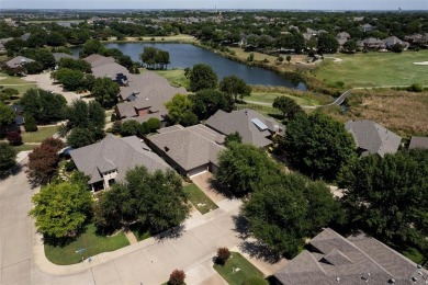 Let the golf cart paths welcome you to this refined single-story on Stonebridge Ranch Country Club in Texas - for sale on GolfHomes.com, golf home, golf lot
