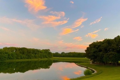 Let the golf cart paths welcome you to this refined single-story on Stonebridge Ranch Country Club in Texas - for sale on GolfHomes.com, golf home, golf lot