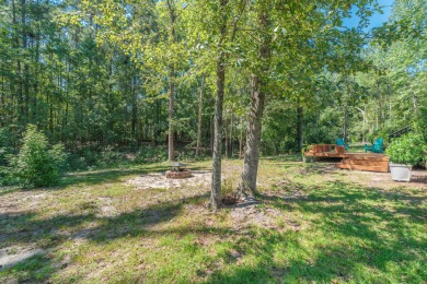 This stunning 3-bedroom, 2-bath home with a spacious flex room on The Golf Club At Cedar Creek in South Carolina - for sale on GolfHomes.com, golf home, golf lot